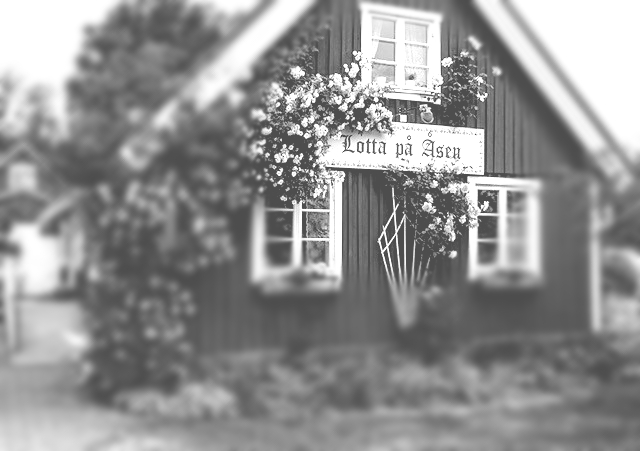 Historic cottage with Lotta på Åsen sign